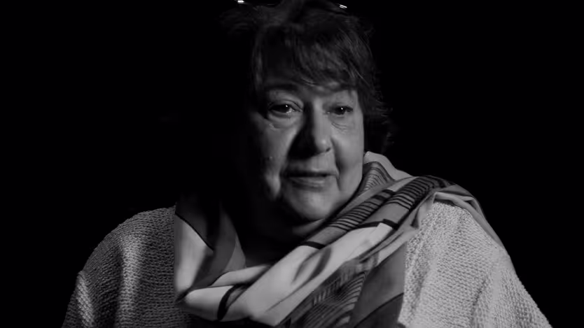 A picture of Magdelena in front of a black background